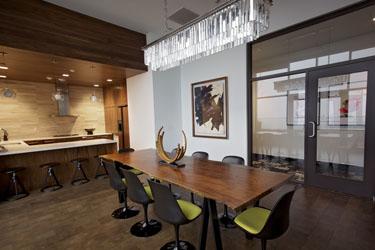 Aster Home custom table and chandelier